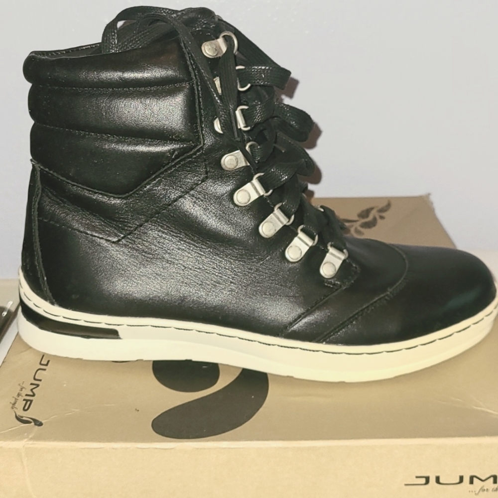 NWT.  Jump black leather sneakers.  Size 8 Men's.
